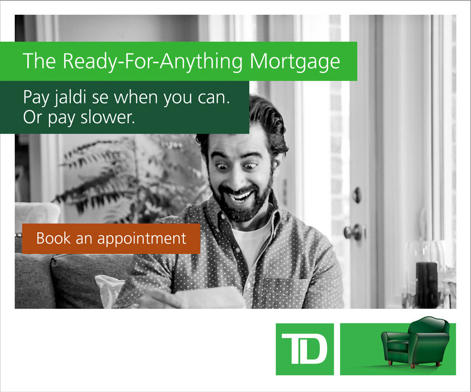 RESL2017_300x250_guy is an ad for TD Ready for Desis mortgages showing a South Asian man reacting in joy to the contents of an envelope.